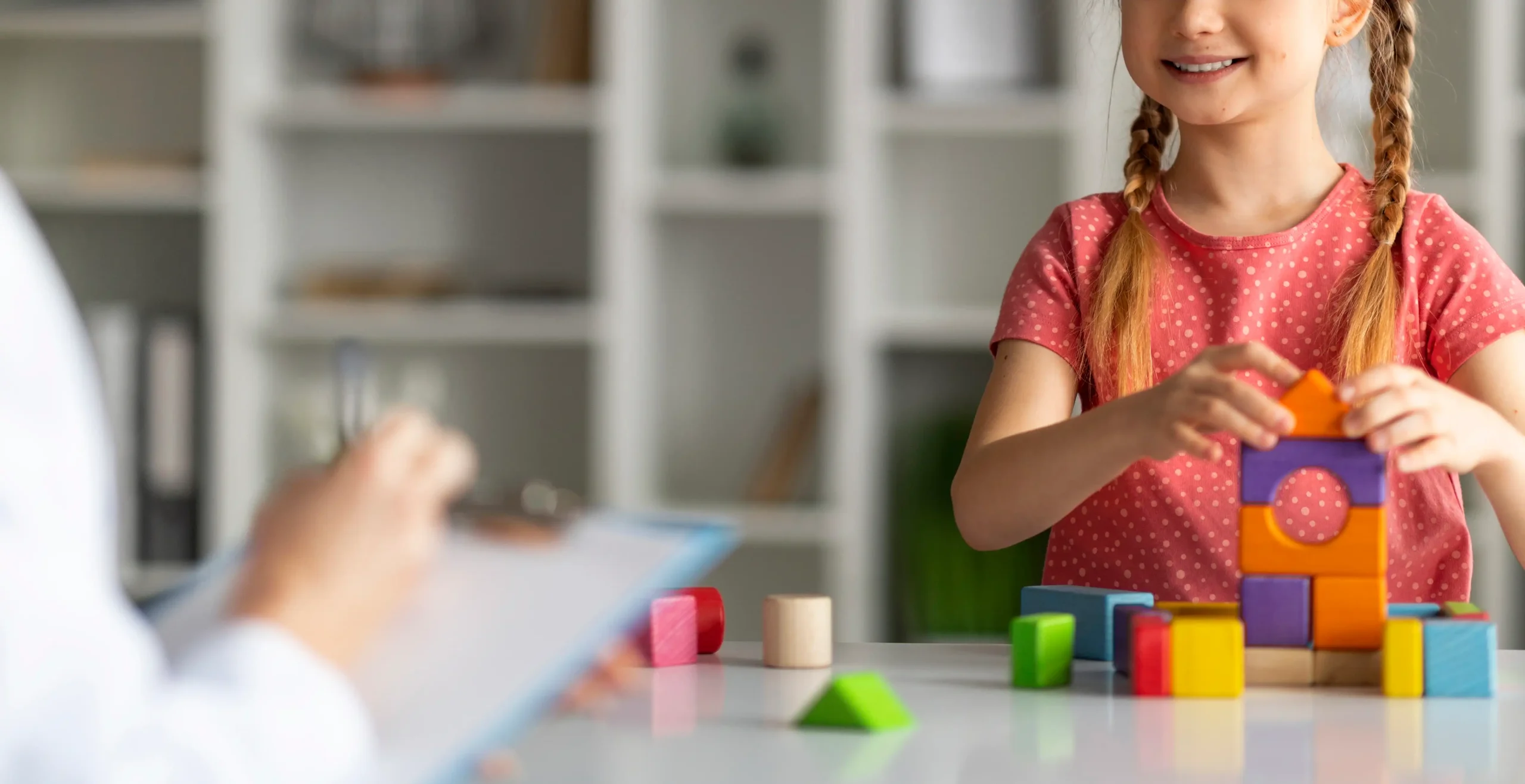young-girl-plays-with-colorful-wooden-building-blo-2026-01-09-08-19-06-utc